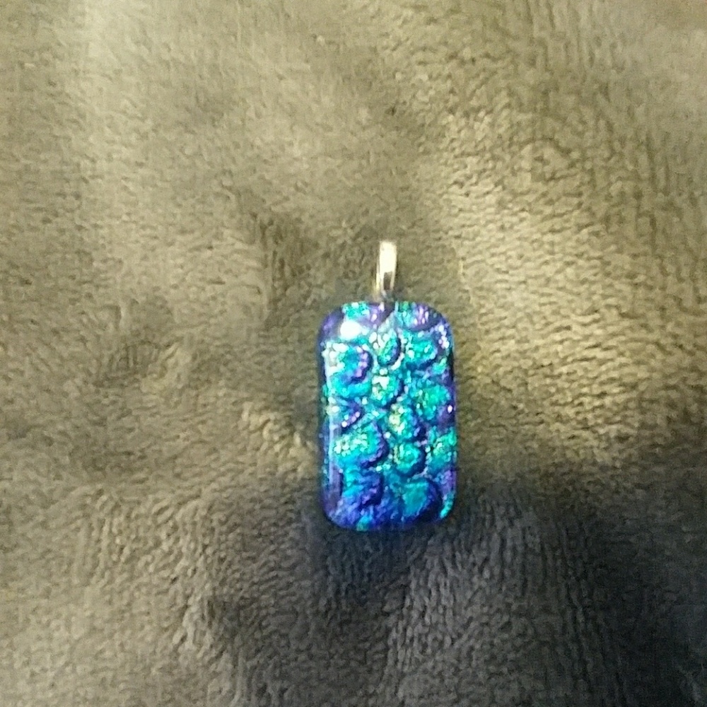 Plastic green and purple iridescent pendant